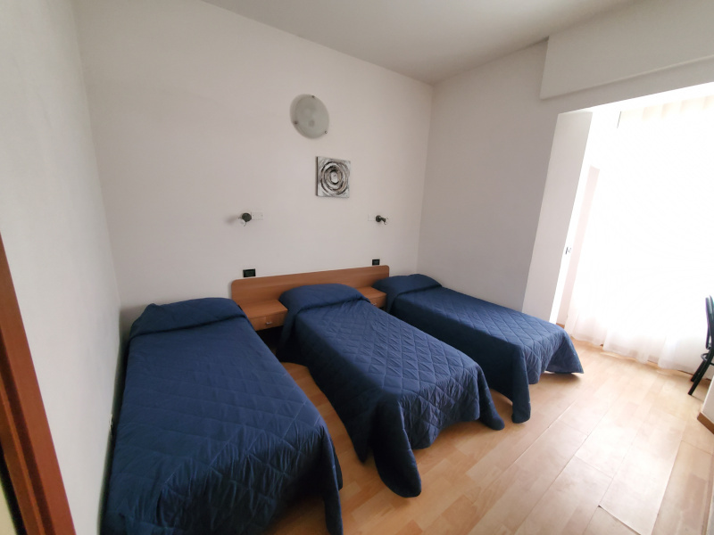 Тримісний номер